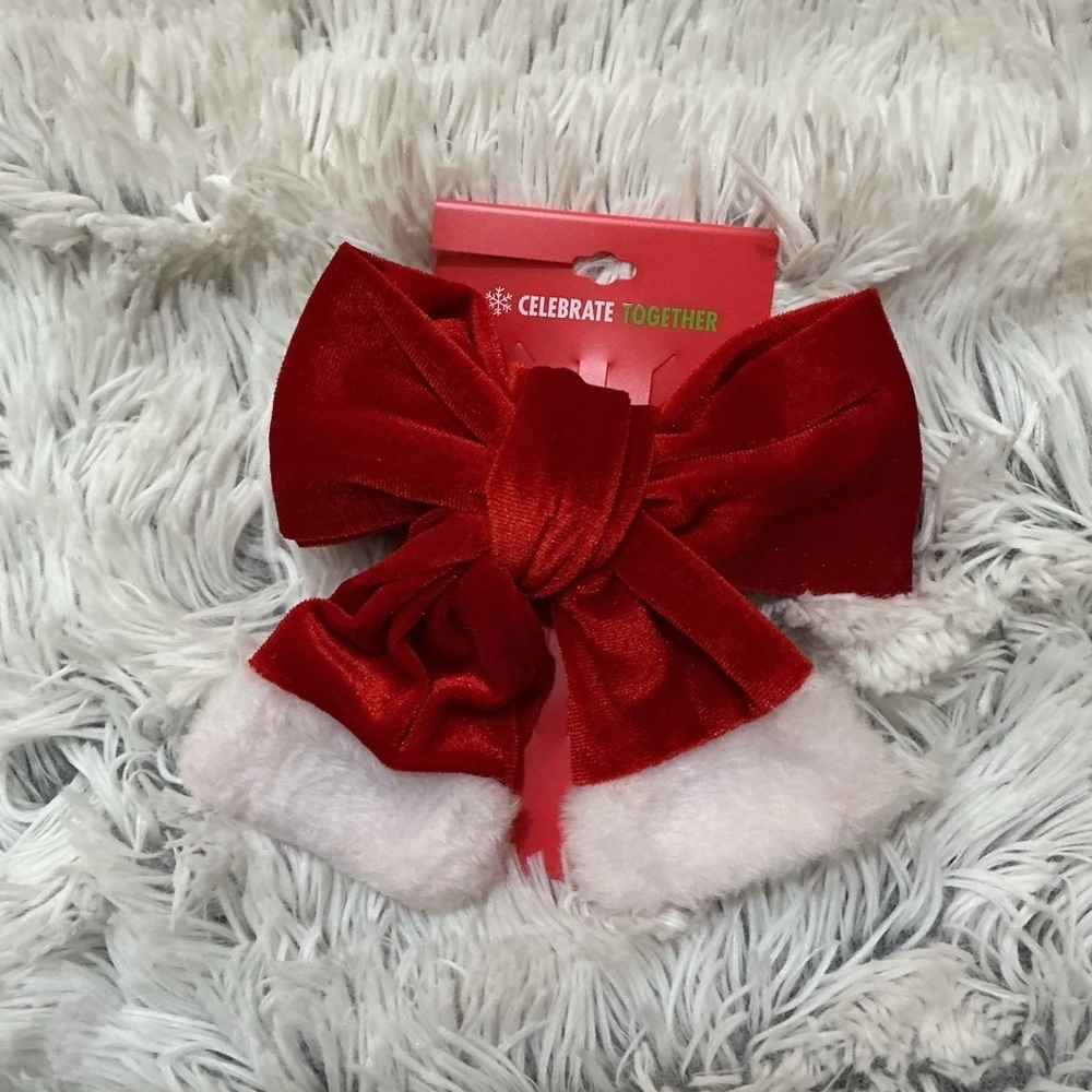 Celebrate Together oversized red velvet bow hair clip with white trim